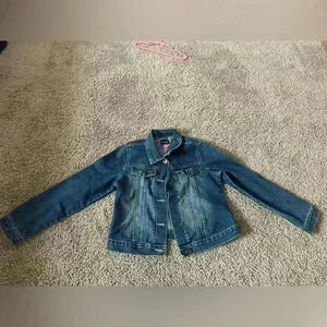 Children place denim jacket.